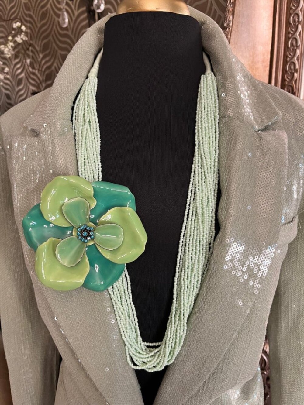 multiple strands of light green glass seed beads necklace